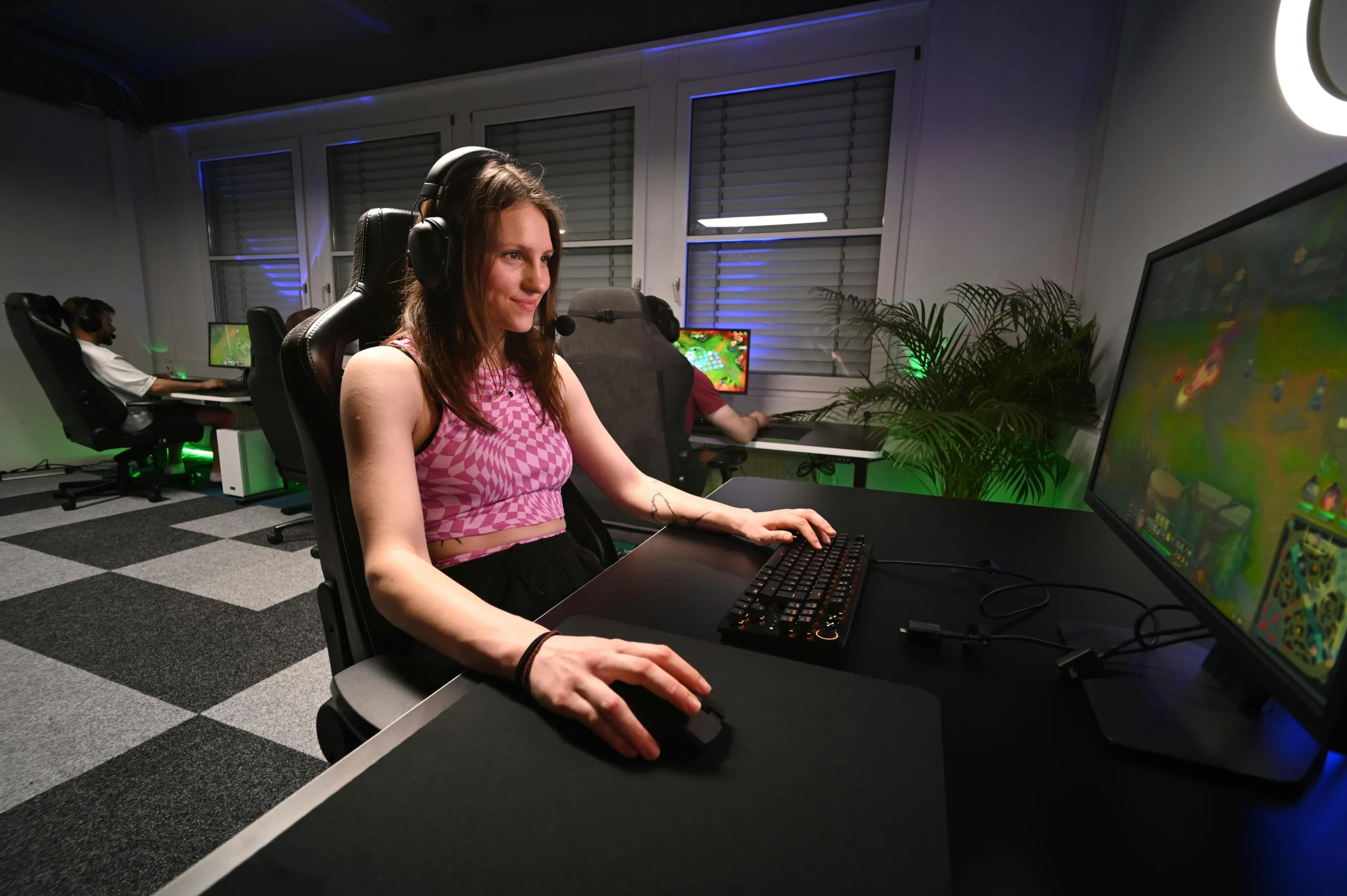 A frustrated gamer sitting in front of a computer